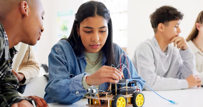 Technology, car robotics and students in classroom, education or learning electronics with car toys for innovation. School kids, learners and transportation knowledge in science class for research.