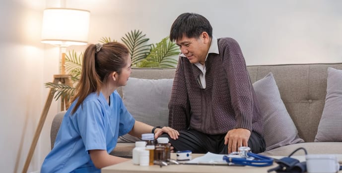 Caregivers assist elderly man with check-ups and physical therapy while he is recover at home..