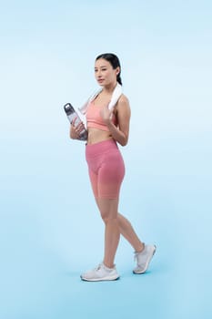 Athletic and sporty asian woman resting and drink water after intensive cardio workout training. Healthy exercising and fit body care lifestyle pursuit in studio shot isolated background. Vigorous