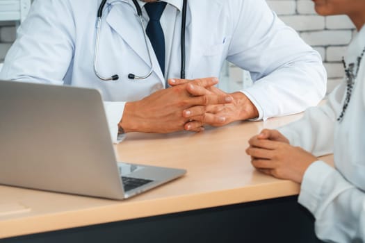 Doctor in professional uniform examining patient at hospital or medical clinic. Health care , medical and doctor staff service concept. Jivy