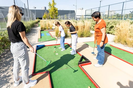 Minigolf player detail on green grass. High quality photo