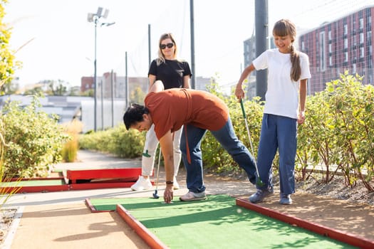 Golf course group of friends people with children posing standing. High quality photo