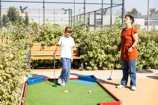A playground in the park equipped for playing mini-golf. High quality photo