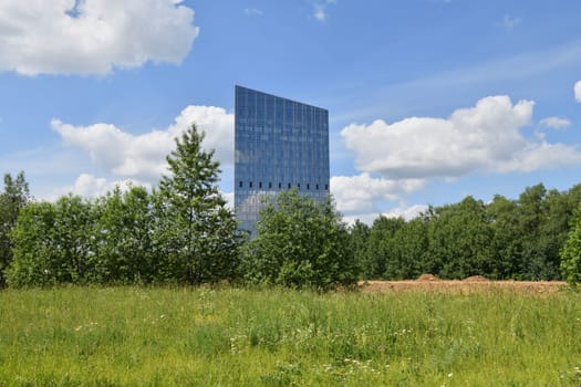 Glass building surrounded by nature