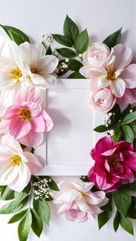 Frame surrounded by spring flowers. High quality photo