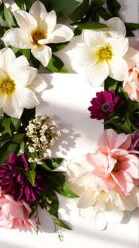 Frame surrounded by spring flowers. High quality photo