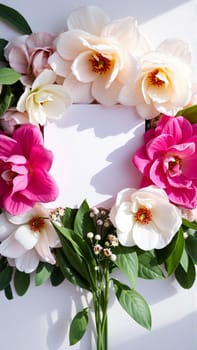 Frame surrounded by spring flowers. High quality photo
