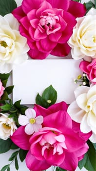 Frame surrounded by spring flowers. High quality photo