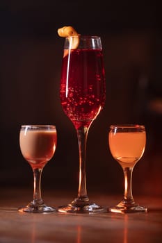 A beautiful bright cocktail. Restaurant, a glass with a drink is on the table.
