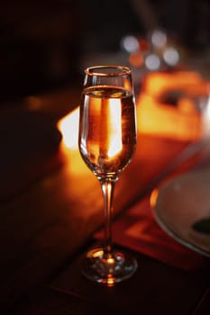 A beautiful bright cocktail. Restaurant, a glass with a drink is on the table.