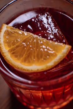 A beautiful bright cocktail. Restaurant, a glass with a drink is on the table.