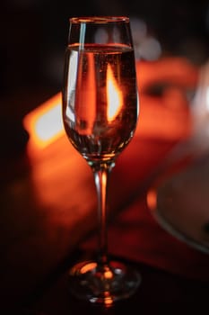 A beautiful bright cocktail. Restaurant, a glass with a drink is on the table.