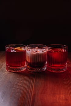 A beautiful bright cocktail. Restaurant, a glass with a drink is on the table.