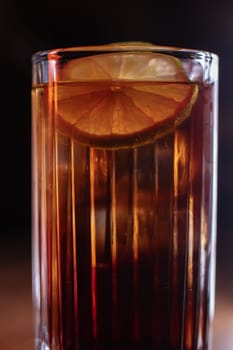 A beautiful bright cocktail. Restaurant, a glass with a drink is on the table.