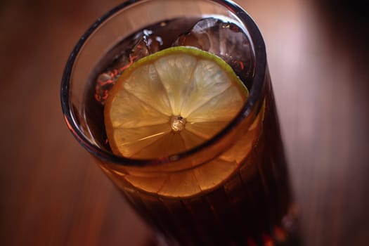 A beautiful bright cocktail. Restaurant, a glass with a drink is on the table.