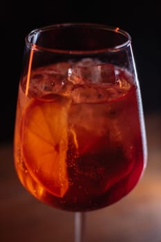 A beautiful bright cocktail. Restaurant, a glass with a drink is on the table.