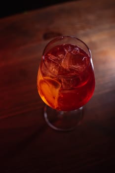 A beautiful bright cocktail. Restaurant, a glass with a drink is on the table.