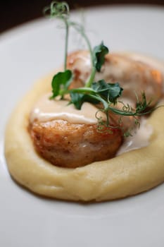 Delicious cutlets with airy mashed potatoes served in the restaurant. The perfect photo for a menu, culinary blog, or an advertisement for catering establishments