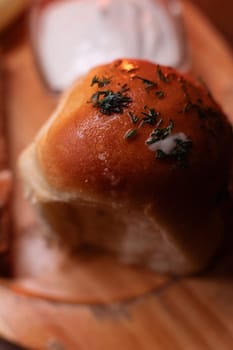 Restaurant dish borscht, delicious bread with bacon, sour cream, bun. A delicious photo for a menu, culinary website, or an advertisement for catering establishments