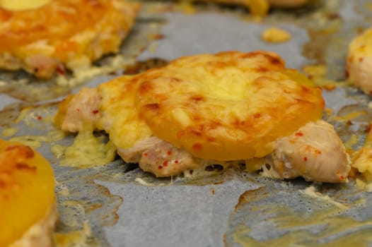 Juicy chicken breast layered with sweet pineapple and gooey cheese, freshly baked to perfection.