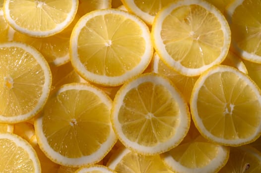 Slices of juicy lemons arranged artfully, capturing the essence of summer in a light-filled kitchen space.