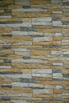 A beautifully arranged stone wall adds a touch of elegance and warmth to contemporary interiors, perfect for decoration.