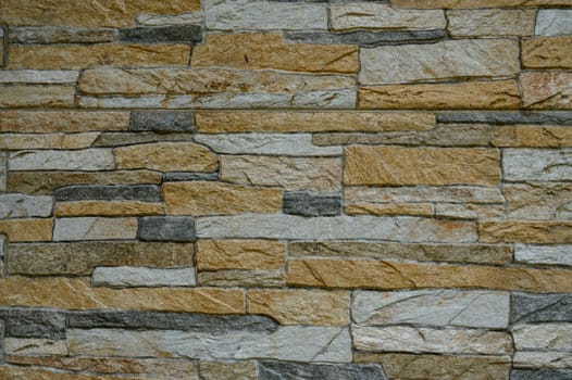 An intricate stone arrangement adds a cozy, earthy vibe with varied textures, ideal for interior decor.
