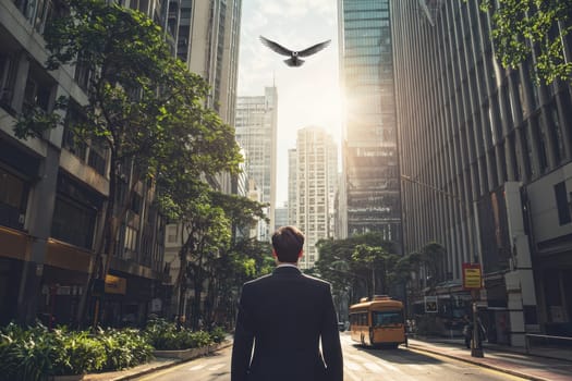 A businessman stands in a serene city street, gazing upwards at a bird soaring above, symbolizing freedom and aspiration in a bustling urban environment.