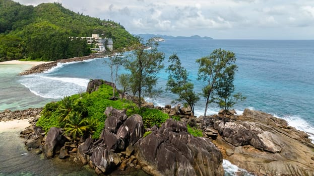Sandy beaches, clear azure waters and lush tropical landscapes. Seychelles, Mahe.