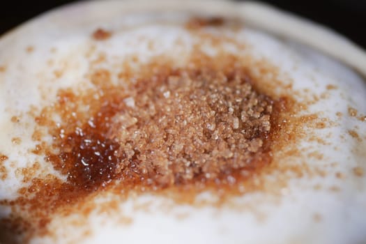 Brown sugar is beautifully arranged atop soft dough, ready to bake.