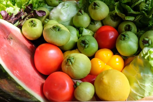 Variety of fresh vegetables in a wooden box. Selective focus.