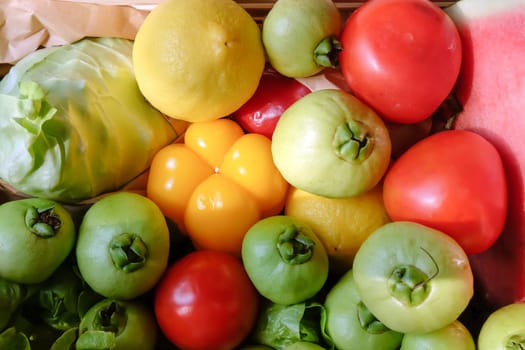 Colorful fresh vegetables and fruits as a background. Top view.