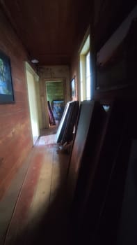 Wooden narrow hallway interior room dark black. High quality photo