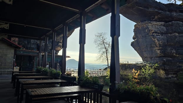 Outdoor rocky restaurant window summer dark room nature travel tourism Czech Republic Europe . High quality photo