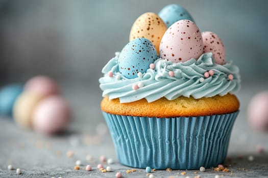 Delicious cupcake decorated with sugar easter eggs on a light blue background