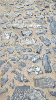 Stones sand pathway gray material architecture street building technology texture background . High quality photo