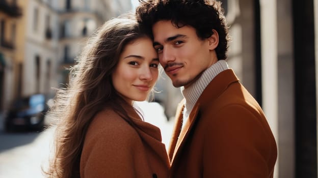 Portrait of beautiful happy smiling young couple together enjoys a walk in sunny city