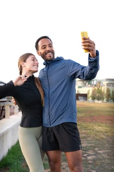 Happy, smiling, sporty friends, ready to exercise or train take a self-portrait. an active lifestyle, health and well-being.
