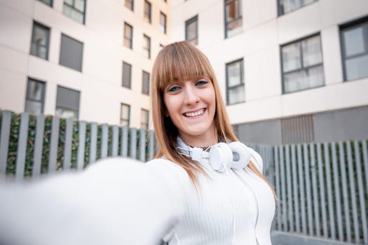 Happy female making a video call with a smartphone.