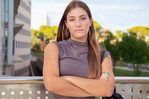 Close-up of thoughtful teenage female student with confident facial expression.