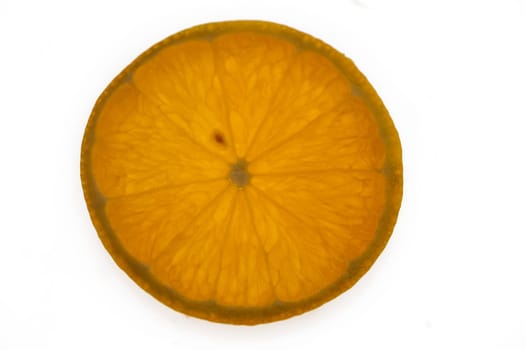 A fresh orange slice showcases its textured flesh and bright color, inviting taste and freshness to the table.