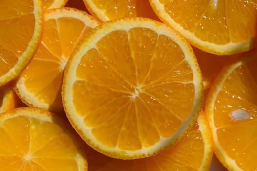 Juicy orange slices fill the space, showcasing their rich color and fresh appeal, perfect for a bright summer dish.