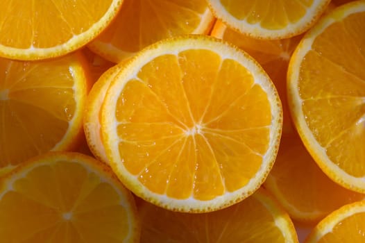 Juicy orange slices display their bright color, inviting the viewer to enjoy their fresh and zesty flavor.