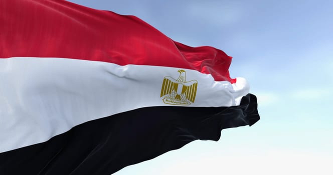 Close-up of Egypt national flag waving on a clear day. Horizontal red, white and black bands. Egyptian eagle emblem centered in white band. 3d illustration render. Close-up. Selective focus