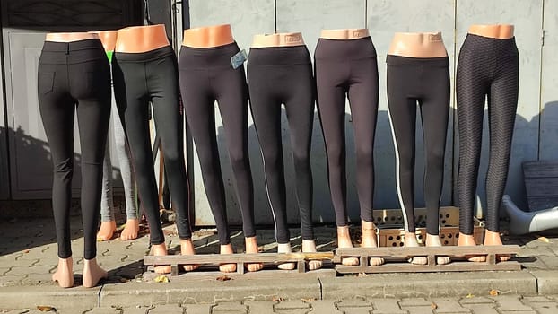 Leggings mannequin display black objects fashion clothing shop street store . High quality photo