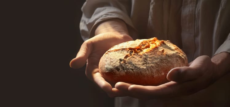 Sacred bread. Eucharistic body of Christ. Man holding a bread. Offertory, Eucharistic Prayer, Consecration, Lord’s Prayer. Daily bread. The Most Holy Body and Blood of Christ