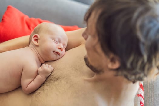 A newborn baby rests peacefully on the father's chest, feeling the warmth and heartbeat of his parent. A tender moment of bonding, love, and security, symbolizing the deep connection between father and child.