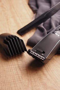 Various grooming tools are neatly displayed on a wooden surface.