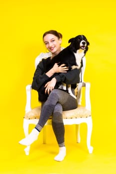 Friendship between people and animals, a studio shot, love, tender, warm feeling and emotion