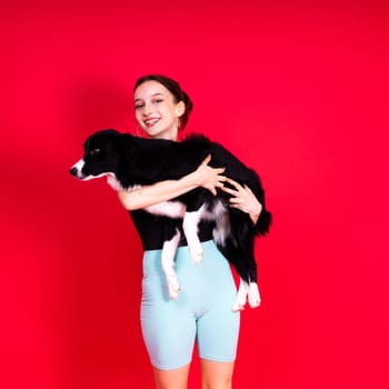 Friendship between people and animals, a studio shot, love, tender, warm feeling and emotion